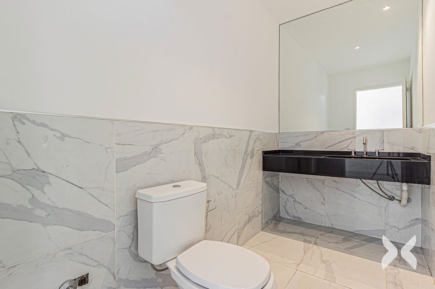 Baño en Calacatta